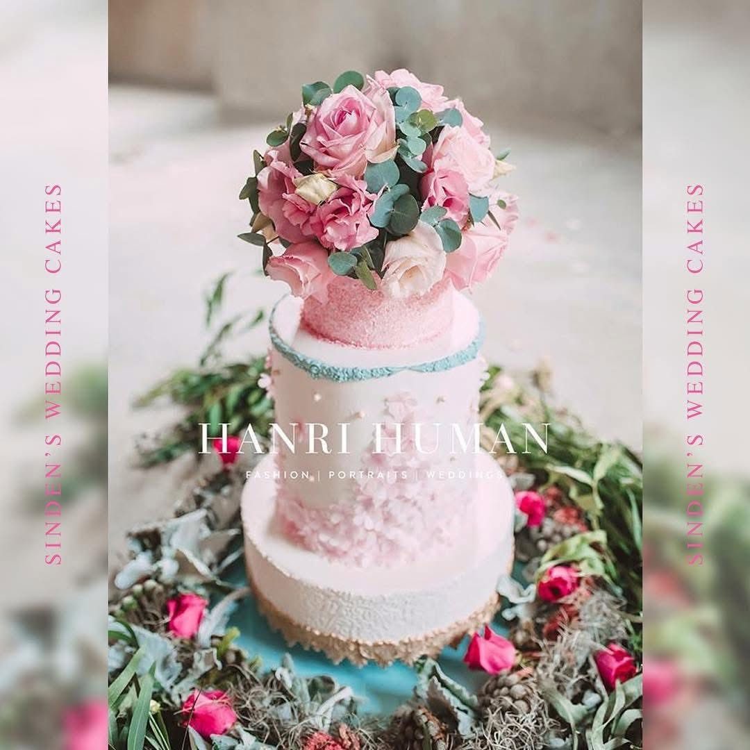 Tiered cake with soft pink florals