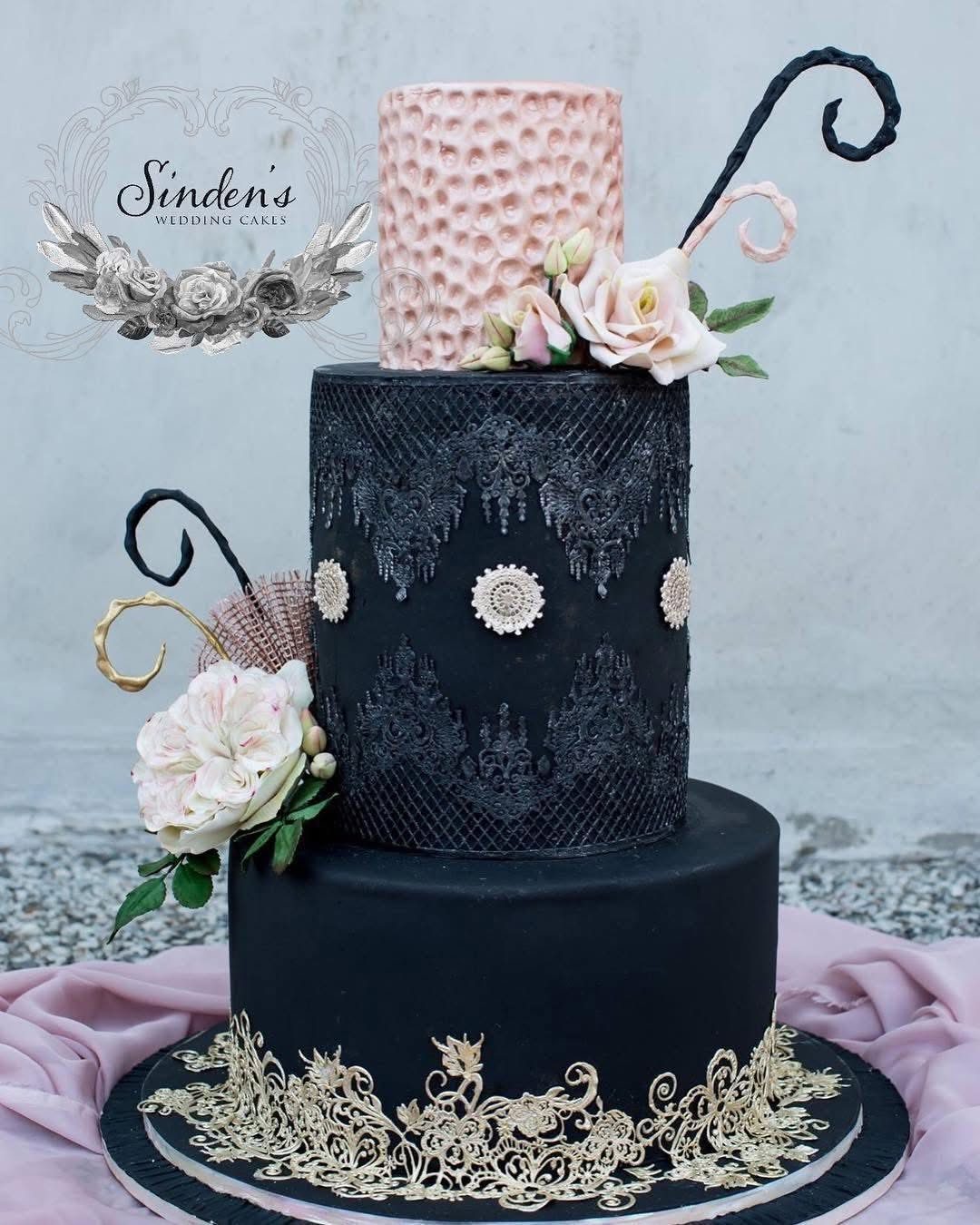 Dramatic navy cake with gold detailing